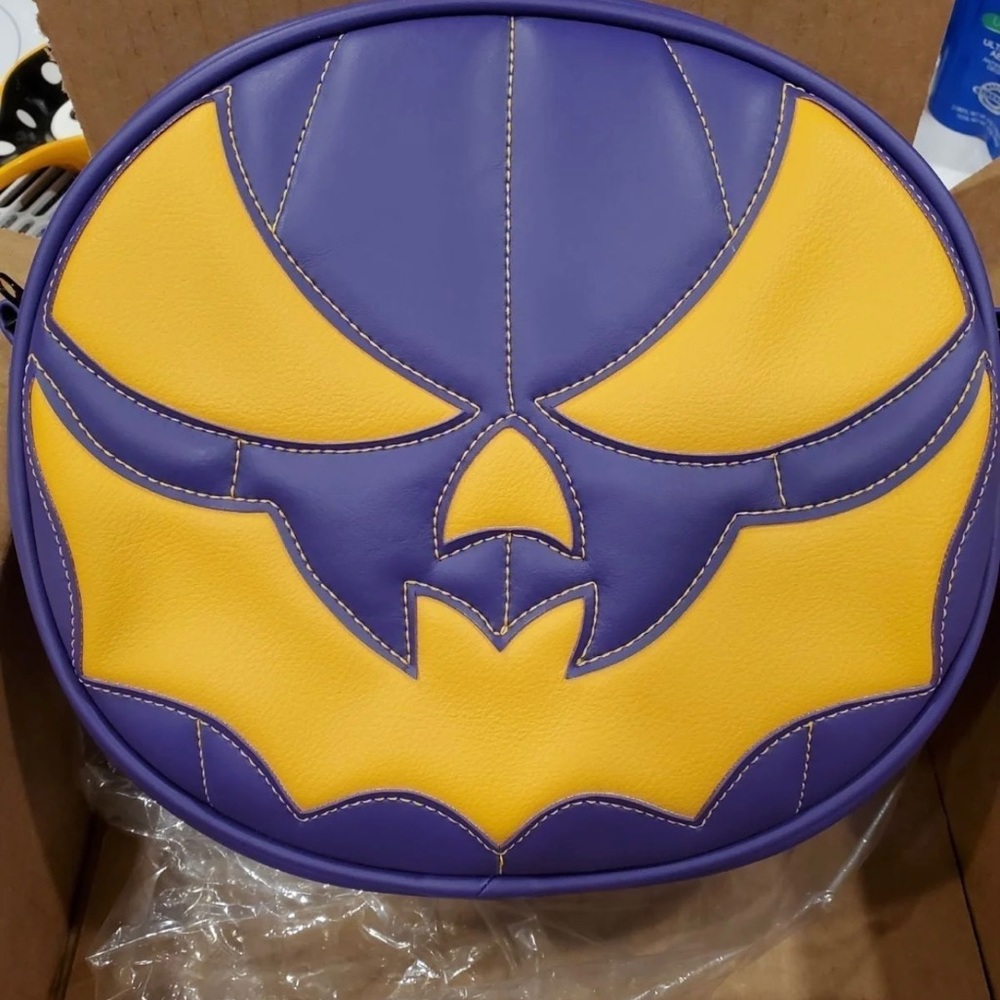 TRADED Love pain and stitches purple and yellow/orange bat mouth